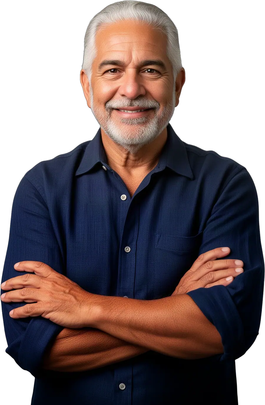 Smiling silver-haired man in a navy shirt with arms crossed